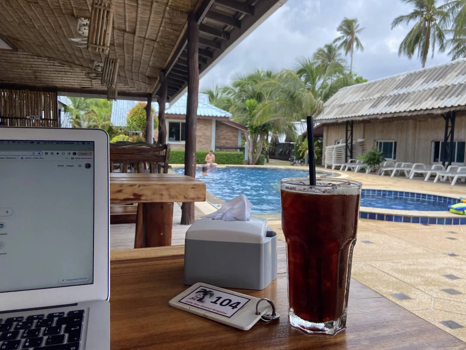 Martin Michálek with a laptop in a Thai resort