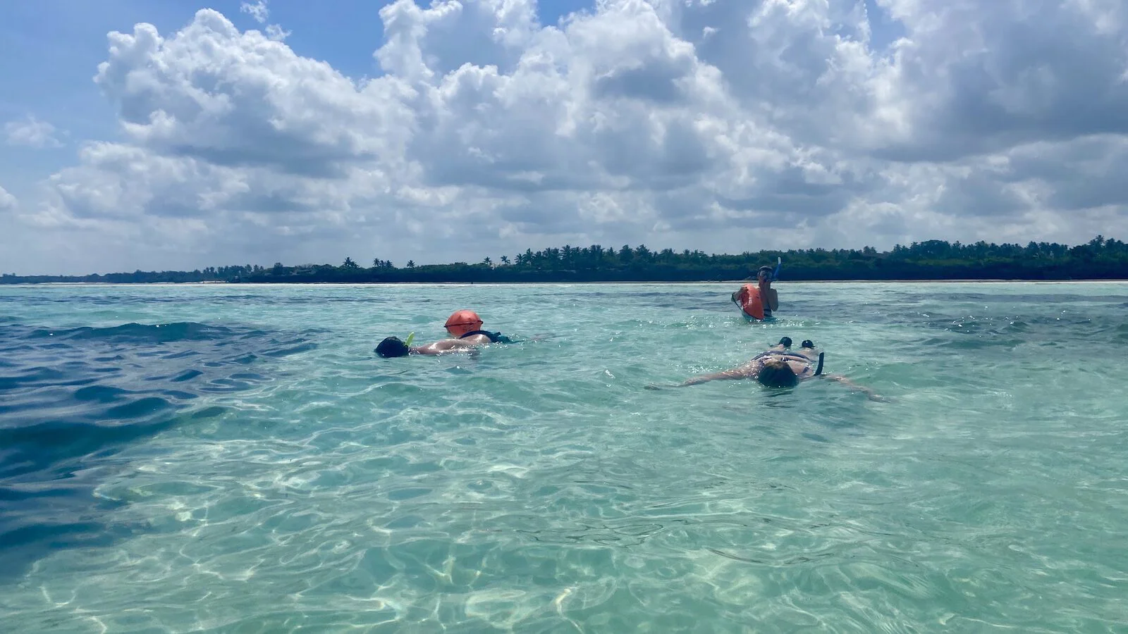 Family snorkelling near Zanzibar